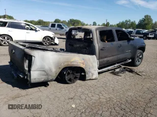 2017 Toyota Tacoma SR5 z VIN 3TMDZ5BN3HM033290, wystawiony jako Copart lot #55990995 z przebiegiem Nie podano mil oraz Szkoda całkowita • Salvage title. Historia ofert i sprzedaży dostępna na DreamBid. Obrazek 3.