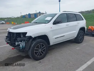 2017 Jeep Grand Cherokee Trailhawk with VIN 1C4RJFLG5HC803400, listed as a IAAI auction lot 42052250 with 108,374 mi miles and . Bid and sale history available at DreamBid. Image 2.