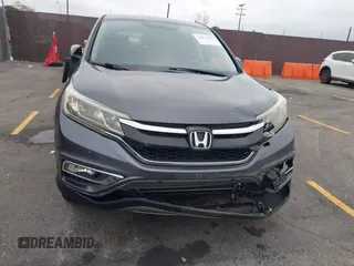 2015 Honda CR-V EX with VIN 3CZRM3H51FG704087, listed as a IAAI auction lot 42074521 with 74,610 mi miles and . Bid and sale history available at carsss.com. Image 12.