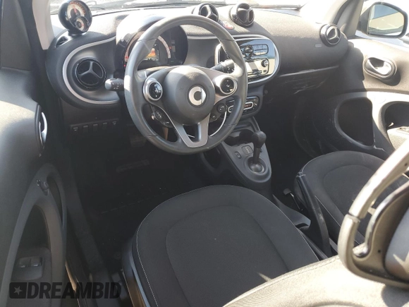 2019 Smart fortwo Pure z VIN WMEFJ9BA4KK386190, wystawiony jako Copart lot #85565094 z przebiegiem 15 531 mil mil oraz Szkody całkowita. Historia ofert i sprzedaży dostępna na DreamBid. Obrazek 8.