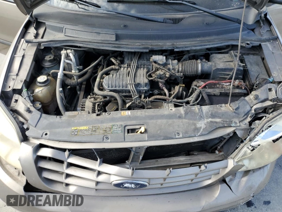 2005 Ford Freestar SE z VIN 2FMDA51635BA60614, wystawiony jako Copart lot #60058044 z przebiegiem 228 858 mil mil oraz Szkody całkowita. Historia ofert i sprzedaży dostępna na DreamBid. Obrazek 13.