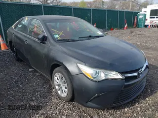 2015 Toyota Camry LE z VIN 4T1BD1FK0FU145824, wystawiony jako IAAI lot #42114108 z przebiegiem 297 191 mil mil oraz . Historia ofert i sprzedaży dostępna na DreamBid. Obrazek 1.