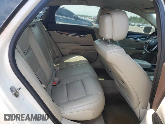 2014 Cadillac XTS Luxury z VIN 2G61M5S38E9215641, wystawiony jako Copart lot #53188695 z przebiegiem 97 431 mil mil oraz Szkody całkowita. Historia ofert i sprzedaży dostępna na DreamBid. Obrazek 10.