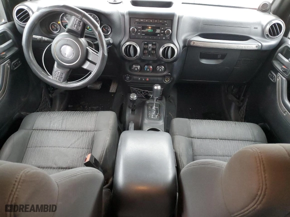 2012 Jeep Wrangler Unlimited Sport with VIN 1C4BJWDG1CL171567, listed as a Copart auction lot 87617405 with 135,802 mi miles and Salvage Title. Bid and sale history available at carsss.com. Image 8.