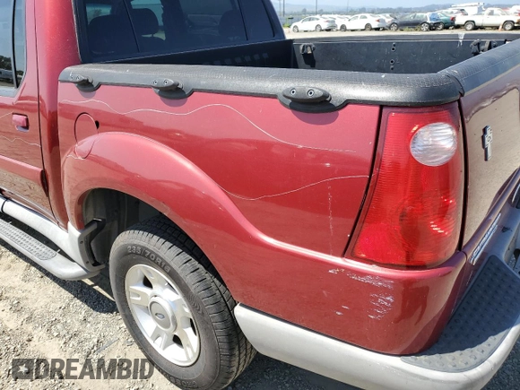 2003 Ford Explorer Sport Trac XLS with VIN 1FMZU67E23UA00848, listed as a Copart auction lot 55514955 with 101,070 mi miles and Salvage title. Bid and sale history available at DreamBid. Image 12.