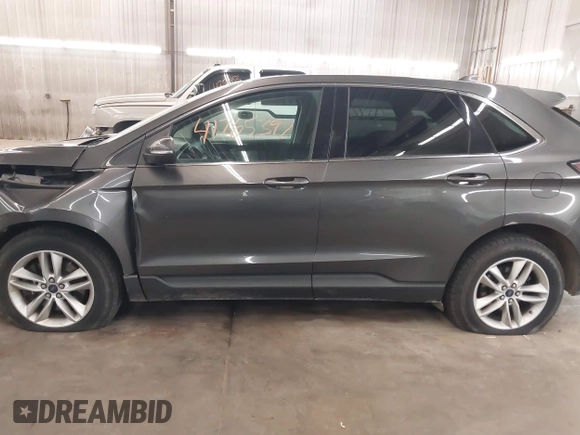 2015 Ford Edge SEL with VIN 2FMTK4J89FBB69648, listed as a IAAI auction lot 41765397 with 160,508 mi miles. Bid and sale history available at carsss.com. Image 15.