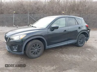 2015 Mazda CX-5 Touring with VIN JM3KE4CY2F0445178, listed as a IAAI auction lot 41828953 with 137,330 mi miles and . Bid and sale history available at DreamBid. Image 18.