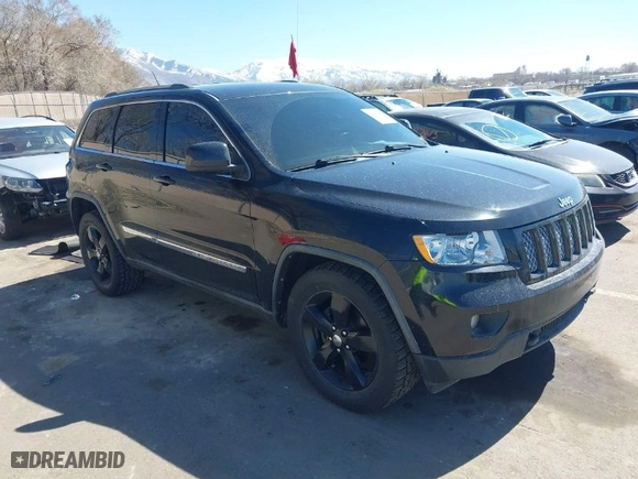 2011 Jeep Grand Cherokee Laredo with VIN 1J4RR4GG0BC656301, listed as a IAAI auction lot 41894106 with 95,293 mi miles. Bid and sale history available at carsss.com. Image 1.