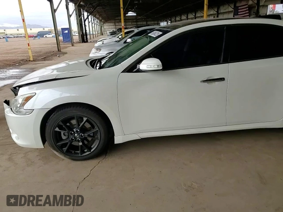 2014 Nissan Maxima SV with VIN 1N4AA5AP5EC906876, listed as a Copart auction lot 56054725 with 89,385 mi miles and Salvage title. Bid and sale history available at DreamBid. Image 14.