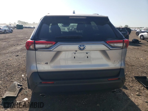 2021 Toyota RAV4 Hybrid LE with VIN 2T3B6RFV7MW019757, listed as a Copart auction lot 61929085 with 14,675 mi miles and Salvage title. Bid and sale history available at DreamBid. Image 6.