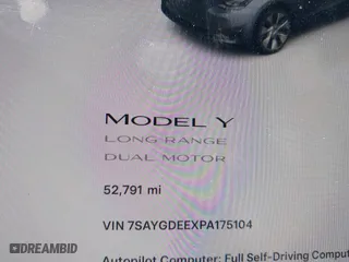 2023 Tesla Model Y Long Range with VIN 7SAYGDEEXPA175104, listed as a IAAI auction lot 41821928 with 52,791 mi miles. Bid and sale history available at carsss.com. Image 15.