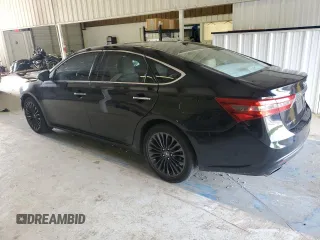 2016 Toyota Avalon Limited with VIN 4T1BK1EB9GU216124, listed as a Copart auction lot 54565495 with 192,136 mi miles and Salvage Title. Bid and sale history available at DreamBid. Image 2.