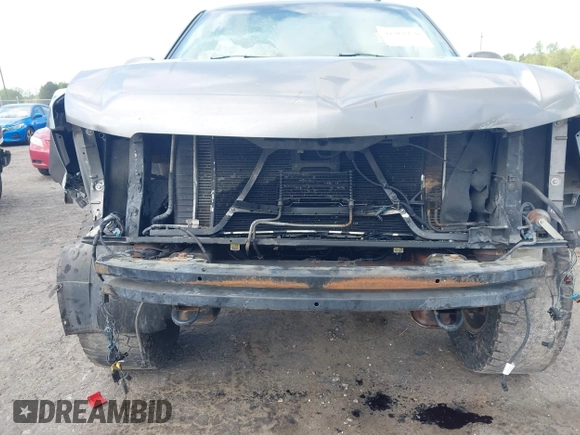 2007 Chevrolet Tahoe LTZ with VIN 1GNFK13037J115628, listed as a IAAI auction lot 41962150 with Not provided miles and . Bid and sale history available at DreamBid. Image 13.