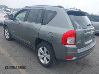 2011 Jeep Compass with VIN 1J4NF1FB7BD244088, listed as a IAAI auction lot 41889165 with 93,576 mi miles. Bid and sale history available at carsss.com. Image 3.