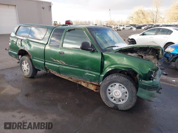 1997 GMC Sonoma SLS with VIN 1GTDT19X0V8502966, listed as a IAAI auction lot 41331331 with 308,584 mi miles. Bid and sale history available at carsss.com. Image 1.