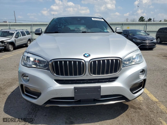 2019 BMW X6 sDrive35i with VIN 5UXKU0C57K0S97385, listed as a Copart auction lot 69103994 with 44,186 mi miles and Salvage Title. Bid and sale history available at carsss.com. Image 5.