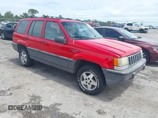 1994 Jeep Grand Cherokee Laredo z VIN 1J4GZ58YXRC168746, wystawiony jako IAAI lot #42595739 z przebiegiem 224 039 mil mil oraz . Historia ofert i sprzedaży dostępna na DreamBid. Obrazek 1.