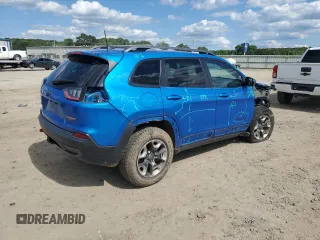 2019 Jeep Cherokee Trailhawk with VIN 1C4PJMBX0KD311114, listed as a Copart auction lot 58799765 with 60,833 mi miles and Salvage title. Bid and sale history available at DreamBid. Image 3.