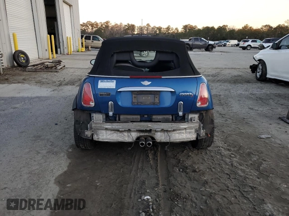 2006 MINI Convertible S with VIN WMWRH33526TL93206, listed as a Copart auction lot 46114075 with 60,526 mi miles and Salvage title. Bid and sale history available at DreamBid. Image 6.