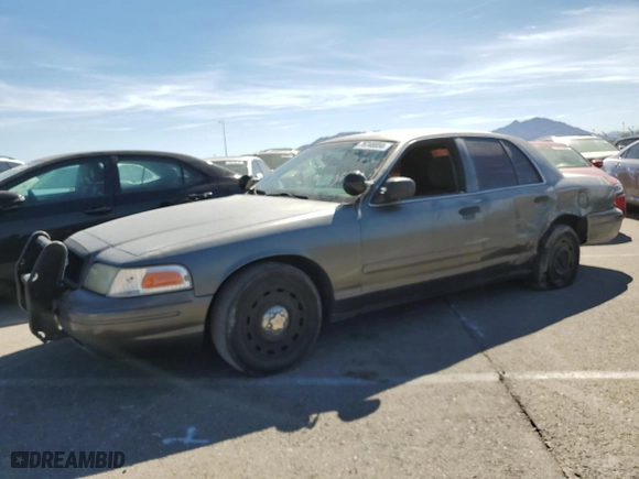 2005 Ford Police Interceptor with VIN 2FAHP71W85X144629, listed as a Copart auction lot 76746654 with 112,761 mi miles and Salvage Title. Bid and sale history available at carsss.com. Image 1.