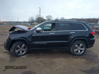2014 Jeep Grand Cherokee Limited z VIN 1C4RJFBG9EC181218, wystawiony jako IAAI lot #42088591 z przebiegiem 159 909 mil mil oraz . Historia ofert i sprzedaży dostępna na DreamBid. Obrazek 13.