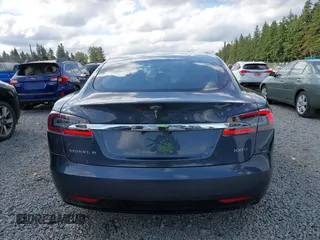 2017 Tesla Model S 100D with VIN 5YJSA1E27HF202563, listed as a IAAI auction lot 42460702 with 71,715 mi miles and . Bid and sale history available at DreamBid. Image 16.