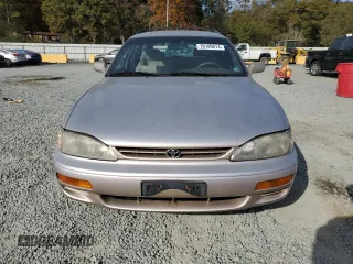 1996 Toyota Camry z VIN 4T1EG12K8TU779386, wystawiony jako Copart lot #79189014 z przebiegiem 142 891 mil mil oraz Czysty tytuł • Clean title. Historia ofert i sprzedaży dostępna na DreamBid. Obrazek 5.