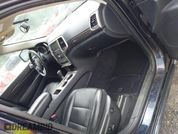2011 Jeep Grand Cherokee Laredo with VIN 1J4RR4GG8BC543468, listed as a IAAI auction lot 42431481 with 224,639 mi miles and . Bid and sale history available at DreamBid. Image 5.