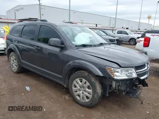 2020 Dodge Journey SE Value z VIN 3C4PDCAB2LT202088, wystawiony jako IAAI lot #41894515 z przebiegiem 97 564 mil mil oraz . Historia ofert i sprzedaży dostępna na DreamBid. Obrazek 1.