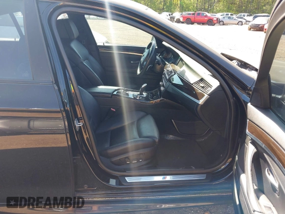 2013 BMW 5 Series 550i with VIN WBAFR9C50DDX81156, listed as a IAAI auction lot 42015608 with 99,962 mi miles and . Bid and sale history available at carsss.com. Image 5.