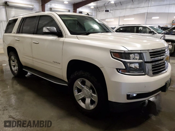 2015 Chevrolet Tahoe LTZ with VIN 1GNSCCKC5FR112071, listed as a Copart auction lot 60681815 with 211,853 mi miles and Clean title. Bid and sale history available at DreamBid. Image 4.