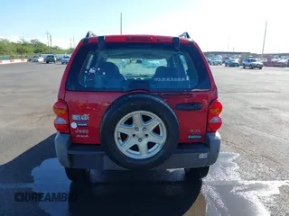 2004 Jeep Liberty Sport with VIN 1J4GL48K04W326252, listed as a IAAI auction lot 41479037 with 168,994 mi miles. Bid and sale history available at carsss.com. Image 16.