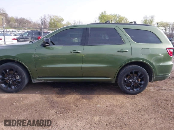 2021 Dodge Durango GT Plus with VIN 1C4RDJDGXMC663928, listed as a IAAI auction lot 42070119 with 77,110 mi miles and . Bid and sale history available at DreamBid. Image 14.
