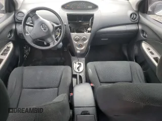 2009 Toyota Yaris with VIN JTDBT903991338082, listed as a Copart auction lot 51156955 with 328,941 mi miles and Salvage Title. Bid and sale history available at carsss.com. Image 8.