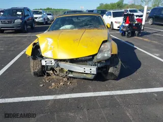 2005 Nissan 350Z Touring with VIN JN1AZ36AX5M753551, listed as a IAAI auction lot 41958722 with 149,132 mi miles. Bid and sale history available at carsss.com. Image 6.
