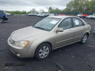 2006 Kia Spectra EX with VIN KNAFE121965337461, listed as a IAAI auction lot 42175939 with 229,723 mi miles. Bid and sale history available at carsss.com. Image 2.