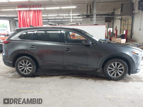 2017 Mazda CX-9 Touring with VIN JM3TCBCY1H0127229, listed as a IAAI auction lot 42320263 with 85,890 mi miles and . Bid and sale history available at DreamBid. Image 13.