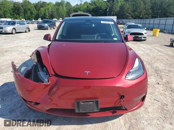 2024 Tesla Model Y Long Range z VIN 7SAYGAEEXRF071829, wystawiony jako Copart lot #56003215 z przebiegiem 29 446 mil mil oraz Szkoda całkowita • Salvage title. Historia ofert i sprzedaży dostępna na DreamBid. Obrazek 5.
