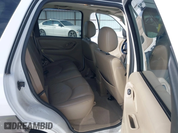 2003 Mazda Tribute ES with VIN 4F2CZ96133KM22960, listed as a IAAI auction lot 41550181 with 159,412 mi miles. Bid and sale history available at carsss.com. Image 8.