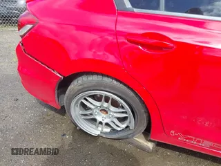 2015 Honda Civic Si z VIN 2HGFB6E59FH705414, wystawiony jako IAAI lot #41795859 z przebiegiem Nie podano mil oraz . Historia ofert i sprzedaży dostępna na DreamBid. Obrazek 19.