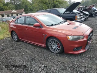 2008 Mitsubishi Lancer Evolution GSR with VIN JA3AW86V78U044861, listed as a Copart auction lot 71229264 with 147,410 mi miles and Clean Title. Bid and sale history available at carsss.com. Image 4.