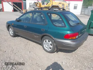 1999 Subaru Impreza Outback Special Sports with VIN JF1GF4853XH813001, listed as a IAAI auction lot 42600060 with Not provided miles and . Bid and sale history available at DreamBid. Image 3.