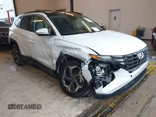 2022 Hyundai Tucson SEL Convenience with VIN KM8JFCA1XNU075554, listed as a IAAI auction lot 41617350 with 29,676 mi miles and . Bid and sale history available at carsss.com. Image 1.