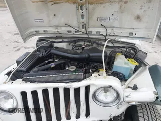 1998 Jeep Wrangler SE with VIN 1J4FY29P9WP793260, listed as a IAAI auction lot 41596990 with 90,766 mi miles. Bid and sale history available at carsss.com. Image 10.