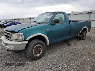 1997 Ford F-150 z VIN 1FTDF18W0VKC65074, wystawiony jako Copart lot #50323755 z przebiegiem 338 454 mil mil oraz Szkoda całkowita • Salvage title. Historia ofert i sprzedaży dostępna na DreamBid. Obrazek 1.