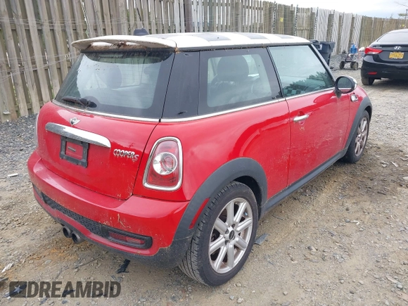 2012 MINI Hardtop S with VIN WMWSV3C52CT385757, listed as a IAAI auction lot 42255285 with 116,660 mi miles and . Bid and sale history available at DreamBid. Image 4.