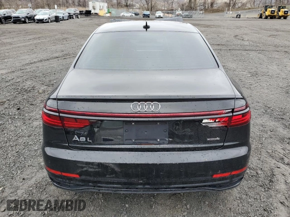 2022 Audi A8 with VIN WAULDAF85NN004895, listed as a Copart auction lot 51758025 with 61,164 mi miles and Salvage title. Bid and sale history available at DreamBid. Image 6.