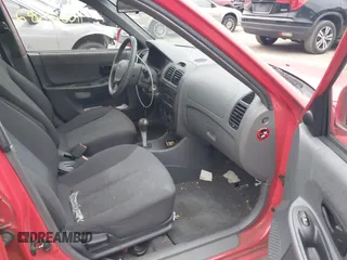 2005 Hyundai Accent GLS with VIN KMHCG45CX5U614083, listed as a IAAI auction lot 41006582 with 72,516 mi miles. Bid and sale history available at carsss.com. Image 5.