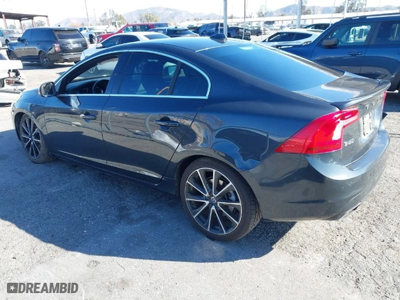2016 Volvo S60 T5 Drive-E Premier with VIN YV126MFK2G2396190, listed as a IAAI auction lot 41682077 with 114,057 mi miles. Bid and sale history available at carsss.com. Image 3.