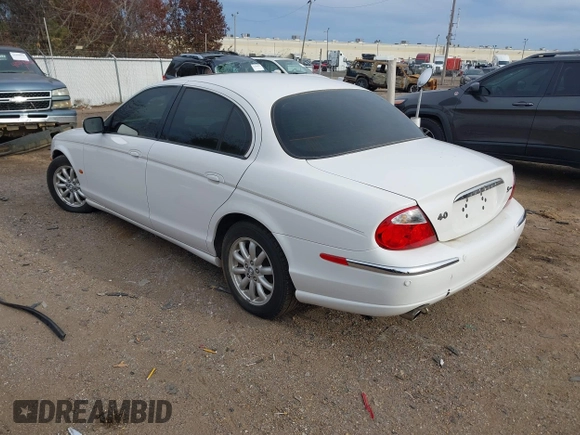2002 Jaguar S-Type with VIN SAJDA01P12GM35163, listed as a IAAI auction lot 41097415 with 114,017 mi miles and . Bid and sale history available at DreamBid. Image 3.